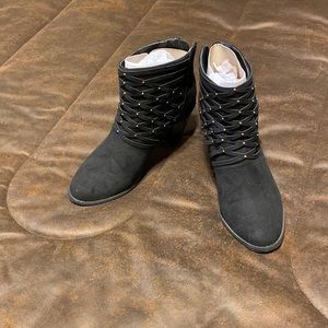 Black suede booties with decorative studs